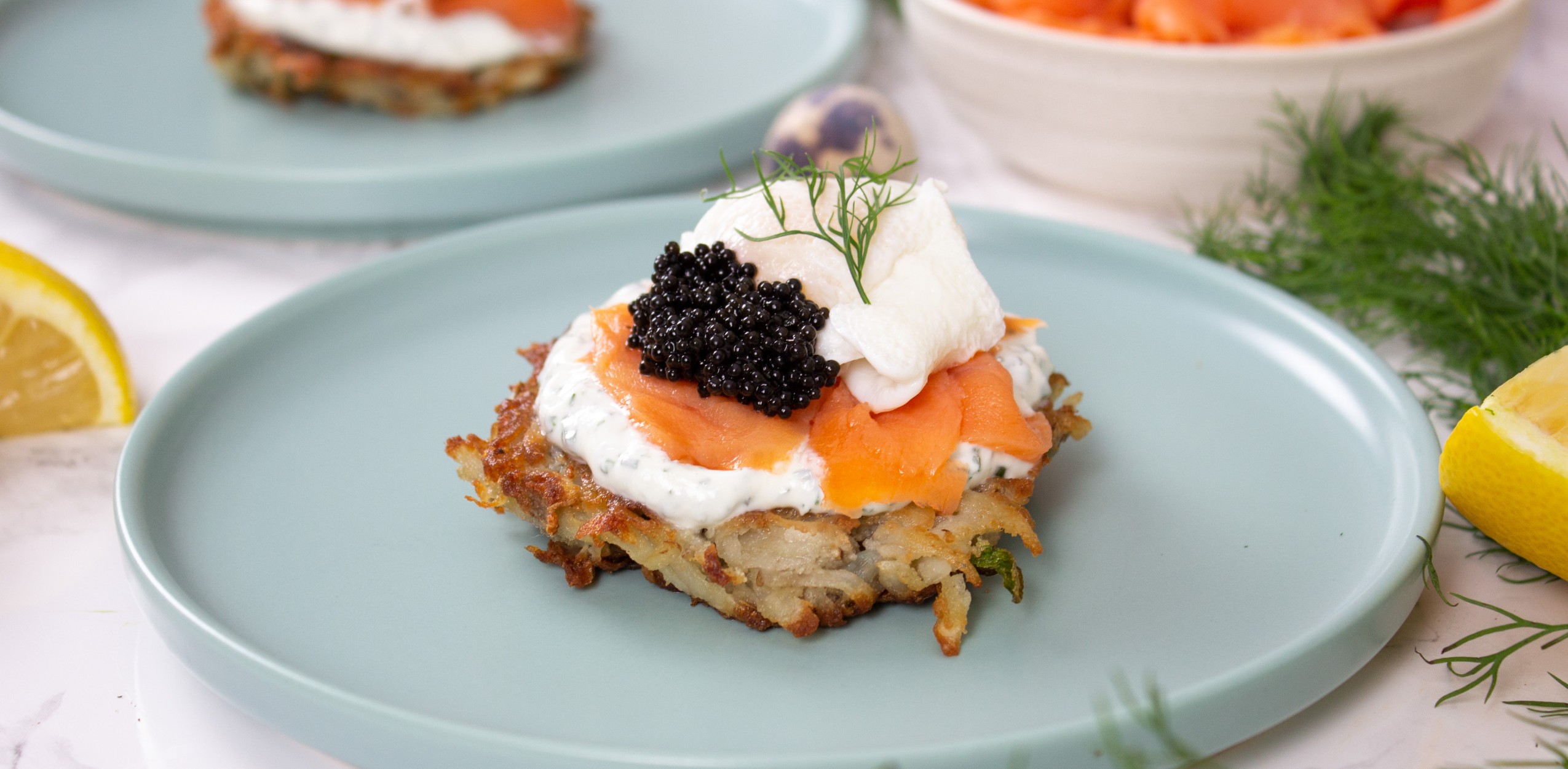 Potato Latkes with Poached Quail Eggs, Lemon Dill Crème Fraîche and Caviar